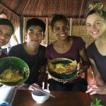 ACE Athletes trying a savory Vietnamese pancake