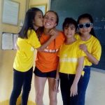 ACE Athlete with their students in Vietnam