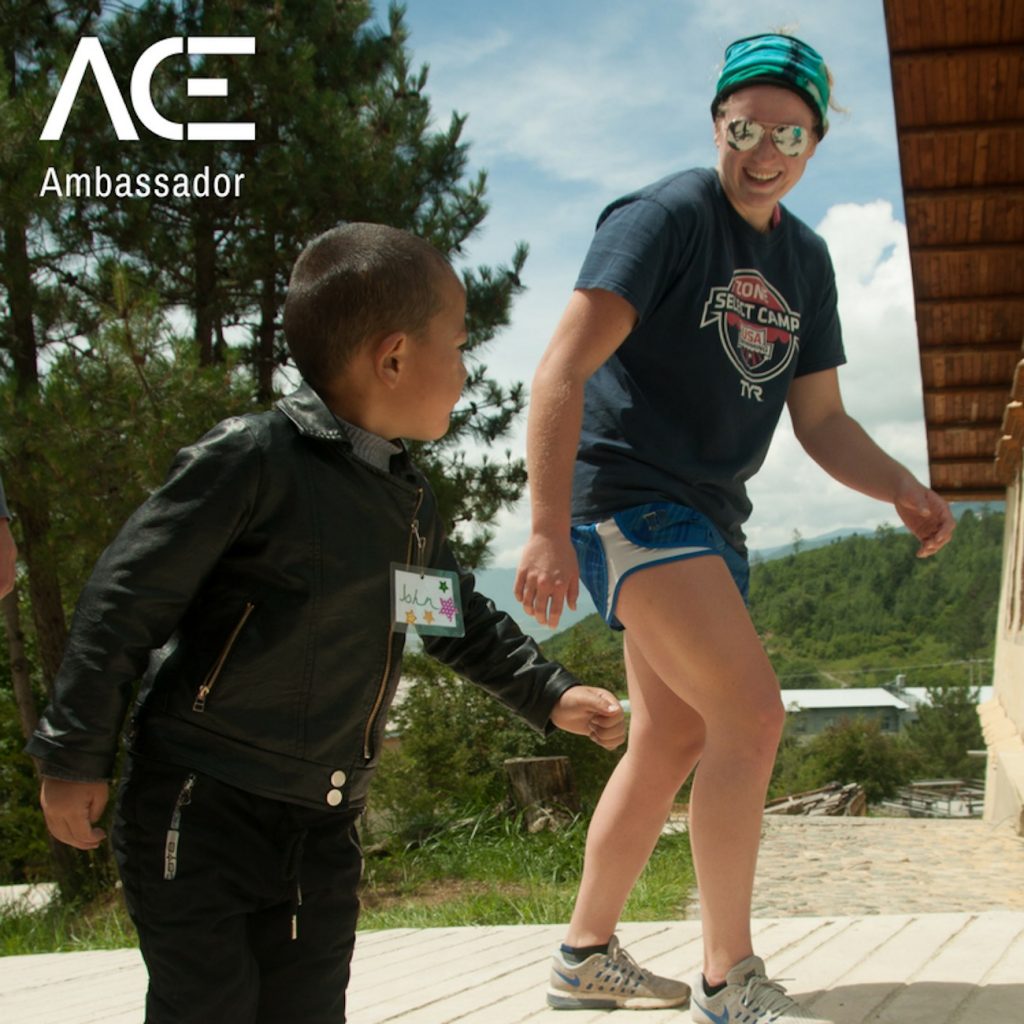 ACE participant playing outside with child