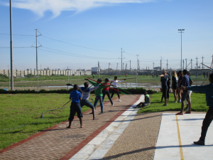 ACE in South Africa Group Playing Games Outside with Students