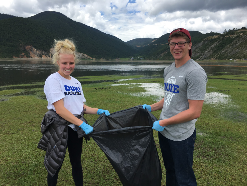 Student-Athletes Cleaning Up Trash at Wetlands