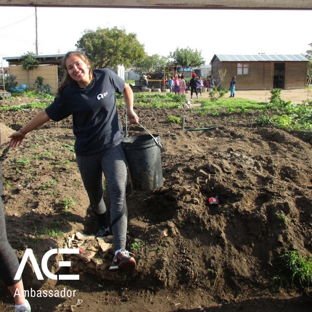 ACE participant building greenhouse