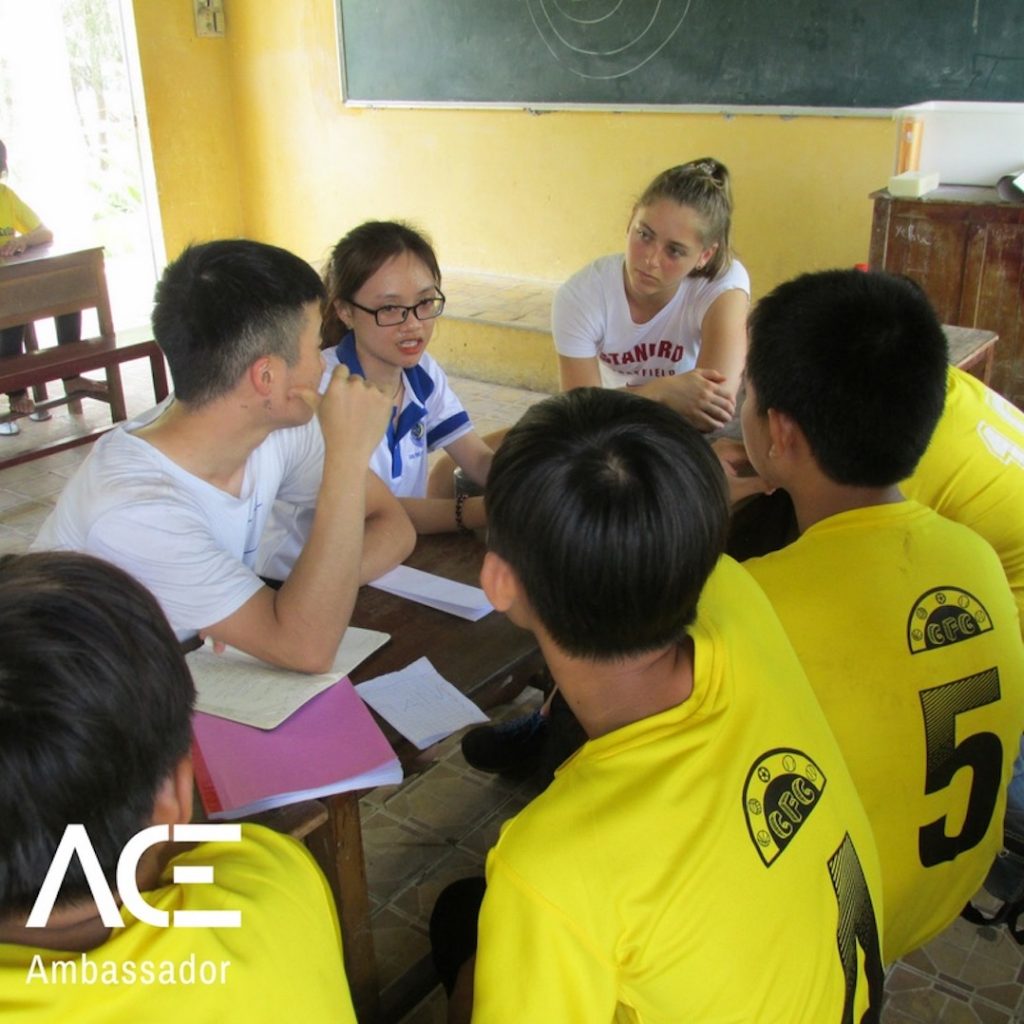 ACE participants doing homework with kids