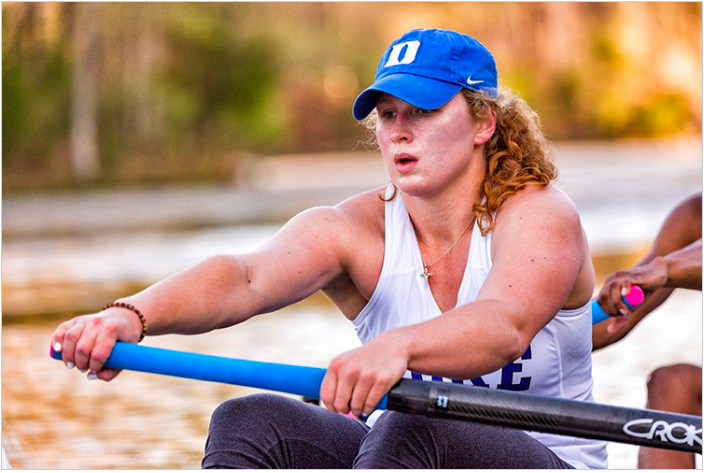 woman rowing outside