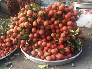 Bowl full of lychees before peeling