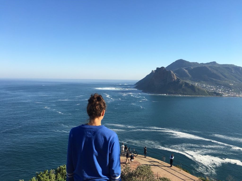 student looking out at the ocean