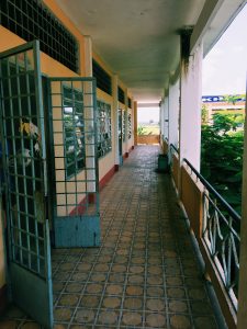 A view of open-air school hallway