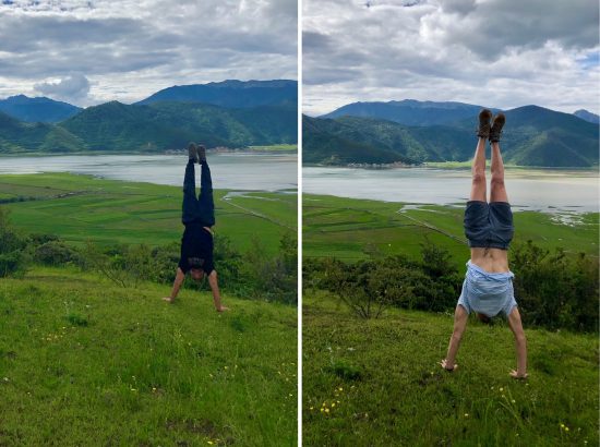 two students doing handstands