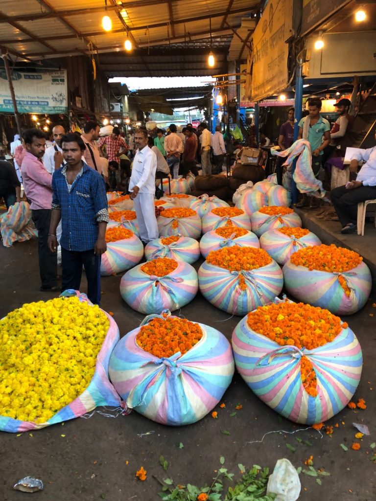 bags of orange and yellow flowers