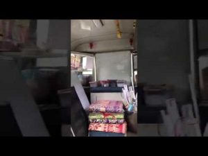 video screenshot of inside of a bus