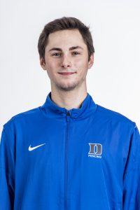 male headshot wearing duke shirt