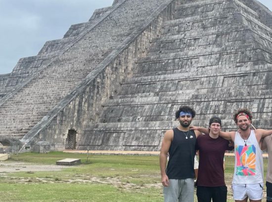 men standing in front of pyramid