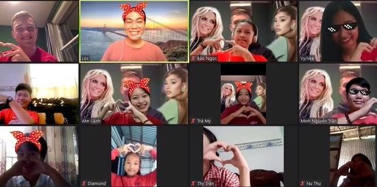 zoom screenshot of group forming hearts with hands