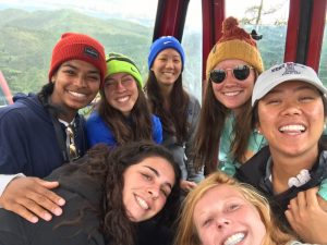 group of women smiling in selfie