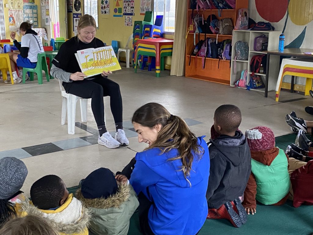 woman teaching group of students