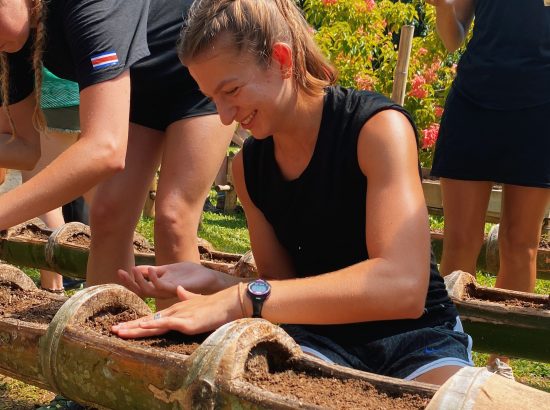 woman engaging in sustainable farming practices