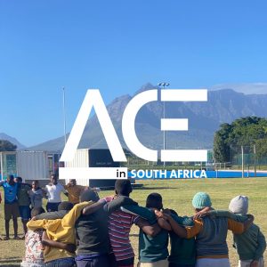 ace south africa logo over people hugging on field