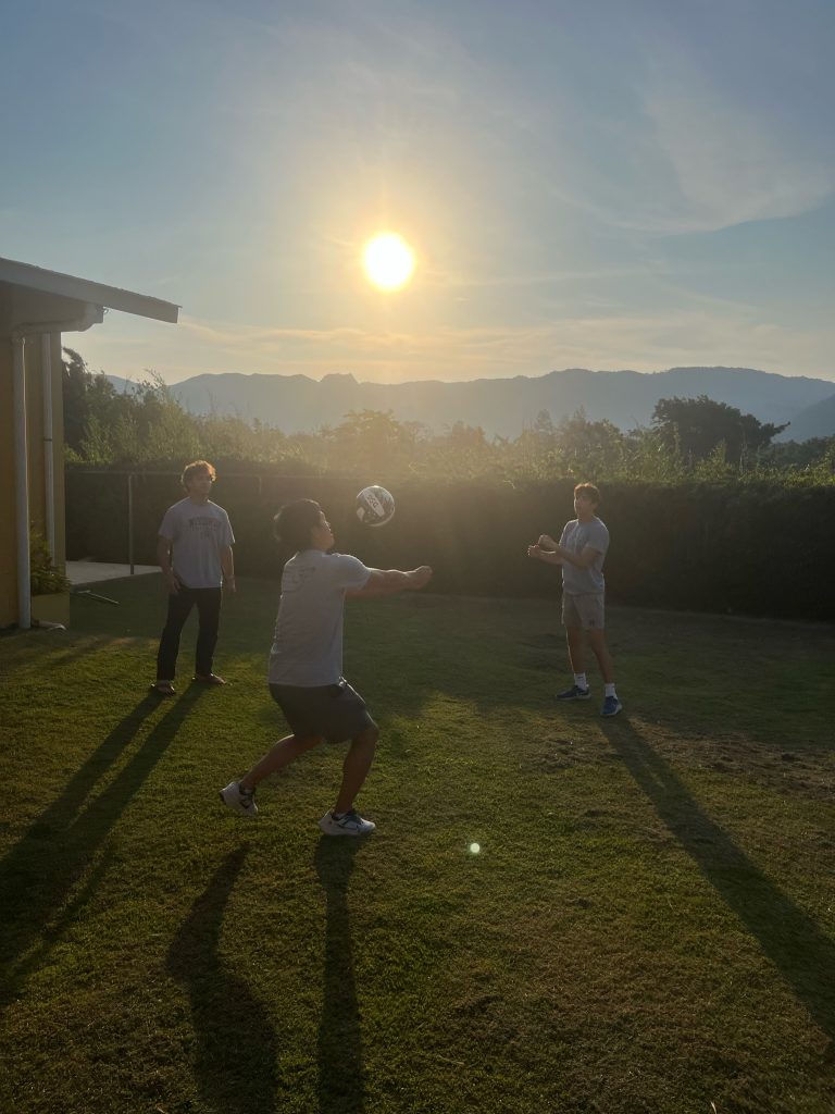 students playing volleyball