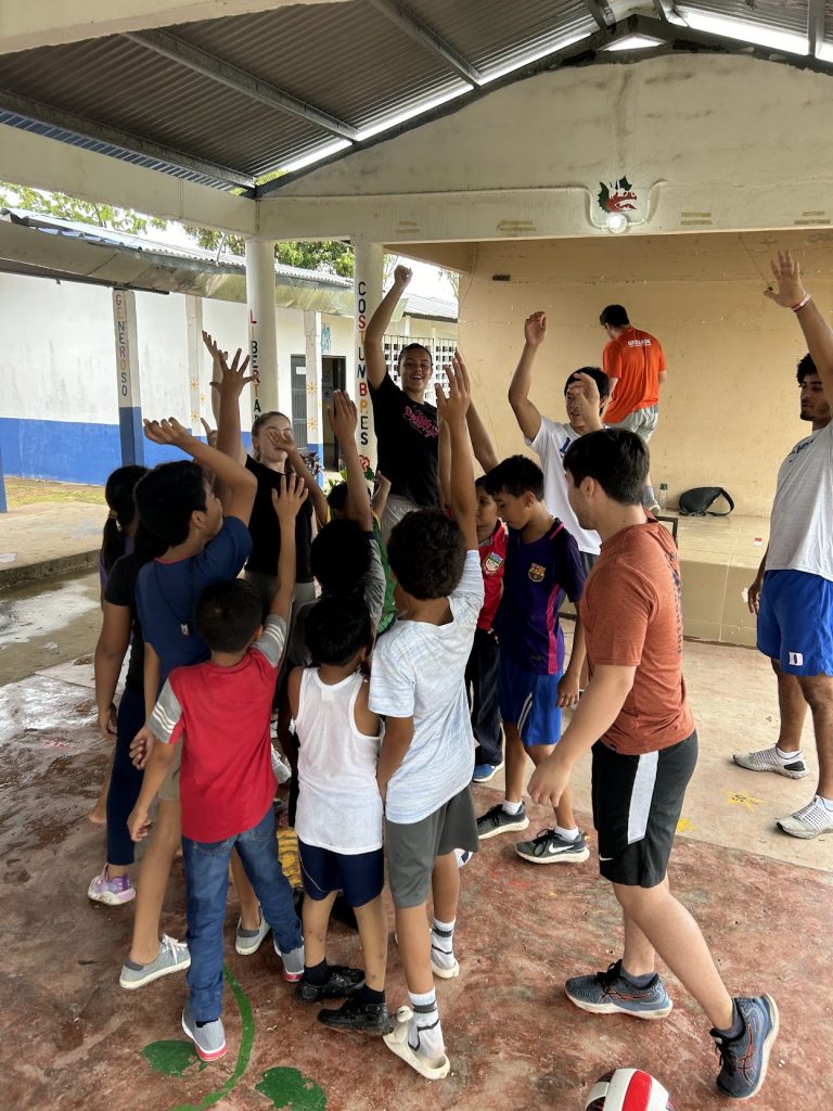 Students celebrating with youth in Panama