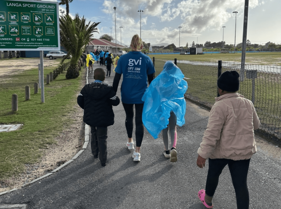 Girl walking with children