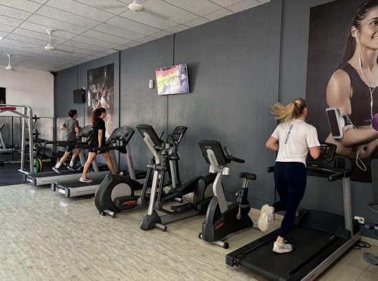 students running in gym