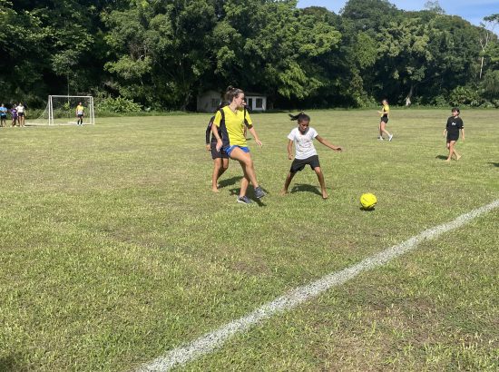 students playing soccer