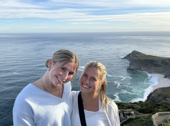 two girls by the ocean