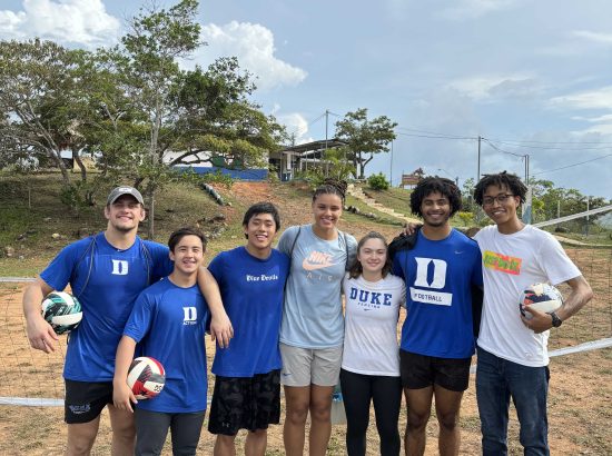 students in panama with volleyballs after practice